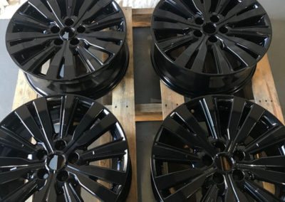 Mag wheels that have been abrasive blasted and then powder coated in the workshop