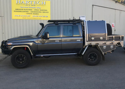 One of the fleet of Hartech mobile abrasive blasting and powder coating vehicles parked outside Workshop number 3 which has just been remodelled