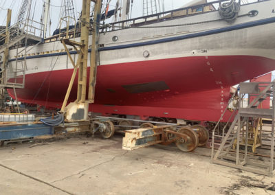 The hull of the One and All Tall ship after there was 5 coats of paint were applied including 3 coats of ozone coating (primer/sealer) plus two coats of anti fouling