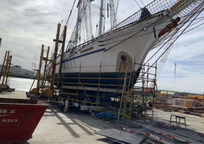 The One and All Tall ship being move into slippage so the abrasive blasting can begin