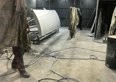 A radial gate which has been sand blasted and undercoated. These Radial gates which are installed by SA Water on Hindmarsh Island separate the Murray river water from the sea water. These gates are 30 0r 40years old and 30 water gates are restored every year and there are 300 of them installed