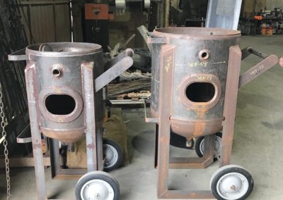 Pressure vessels which have been abrasive blasted and powder coated