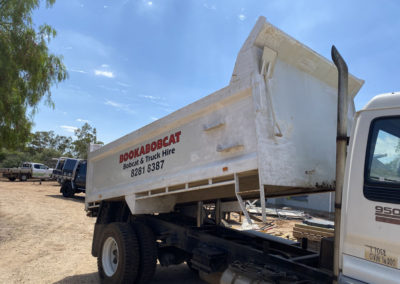 Truck bin on tip truck which was abrasive blasted, epoxy primed and Poly urethane top coat applied whilst still attached to the truck - before